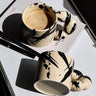 Handmade cream ceramic Cup with Black Splashes 